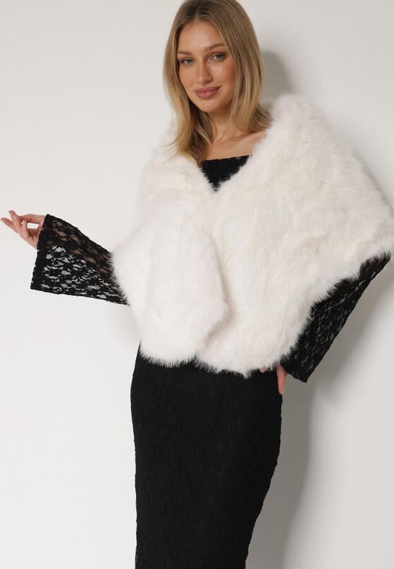 Біле Пончо 1