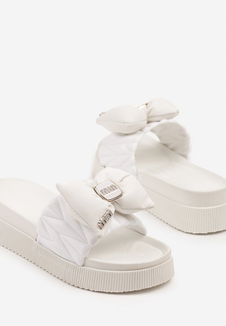 Білі Шльопанці