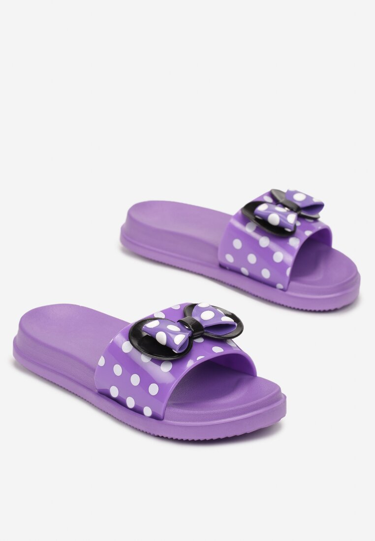 

Фіолетові Шльопанці, Фіолетовий