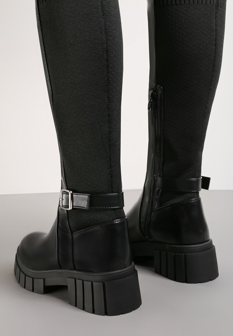 

Чорні Чоботи, Чорний