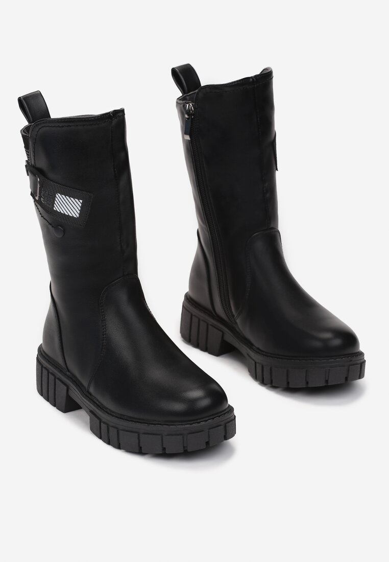 

Чорні Чоботи, Чорний